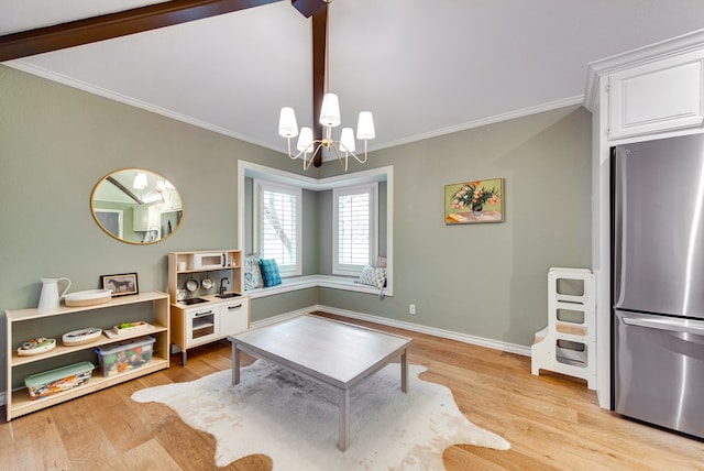 interior space featuring ornamental molding, a chandelier, and light wood-type flooring