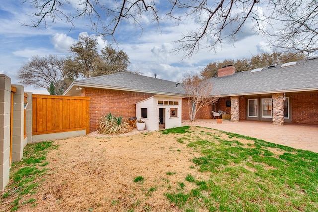 rear view of property featuring a patio