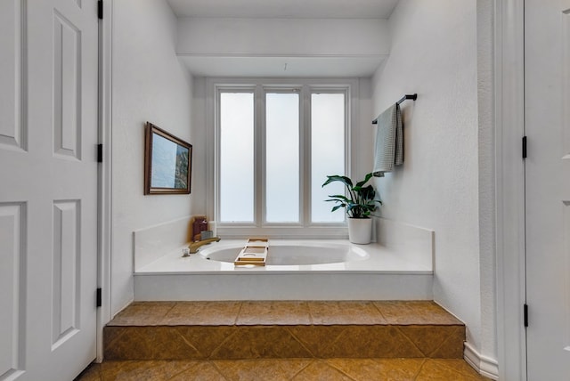 bathroom featuring a tub