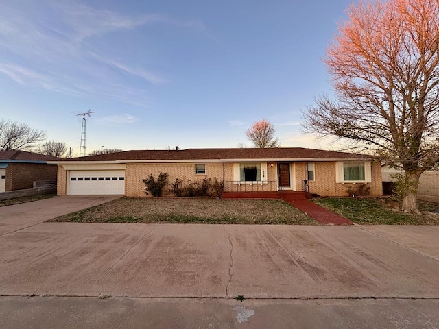 ranch-style house featuring a garage