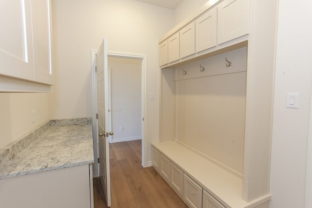 mudroom with light hardwood / wood-style flooring