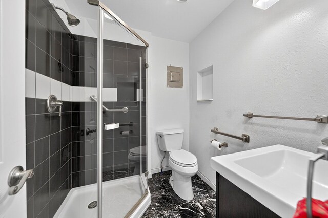 4715 N County Rd 1125, Midland, TX 79705 - full bath featuring marble finish floors, a stall shower, and vanity