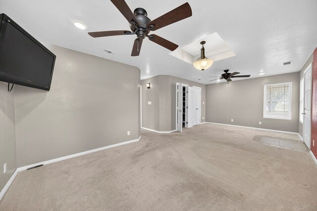 4715 N County Rd 1125, Midland, TX 79705 - unfurnished bedroom with light carpet and a ceiling fan