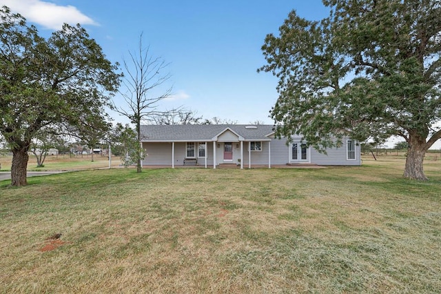 4715 N County Rd 1125, Midland, TX 79705 - ranch-style house featuring a front yard and a shingled roof