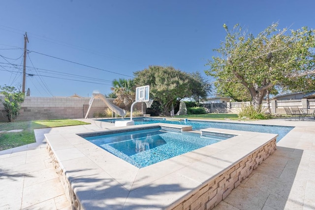 1703 Laurel Ave, Odessa, TX 79761 - view of pool with a water slide, a fenced backyard, and a patio