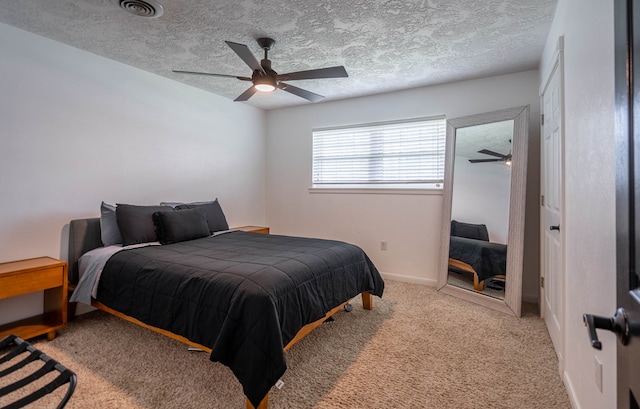 1703 Laurel Ave, Odessa, TX 79761 - bedroom with light carpet and ceiling fan