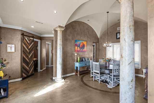 dining room with lofted ceiling, concrete floors, an inviting chandelier, and ornate columns