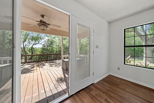 2100 Edgemere Rd, Big Spring, TX 79720 - doorway featuring wood finished floors and ceiling fan