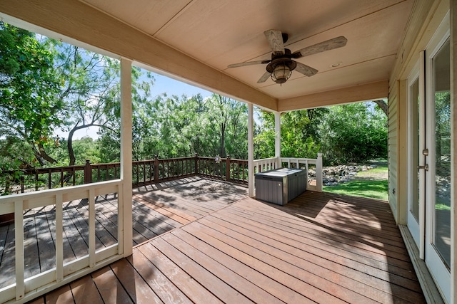 2100 Edgemere Rd, Big Spring, TX 79720 - wooden terrace featuring a ceiling fan and view of wooded area