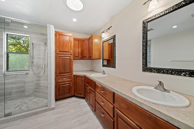 2100 Edgemere Rd, Big Spring, TX 79720 - bathroom with a stall shower and double vanity
