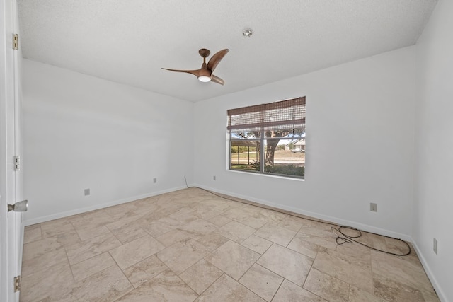 2100 Edgemere Rd, Big Spring, TX 79720 - empty room with ceiling fan and baseboards
