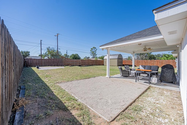 exterior space featuring outdoor lounge area and a storage unit