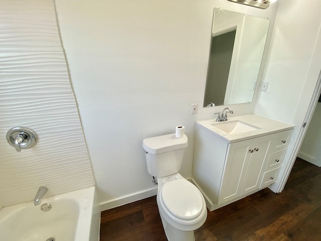 3007 S Anderson Rd, Big Spring, TX 79720 - full bath with vanity, wood finished floors, and shower / tub combination