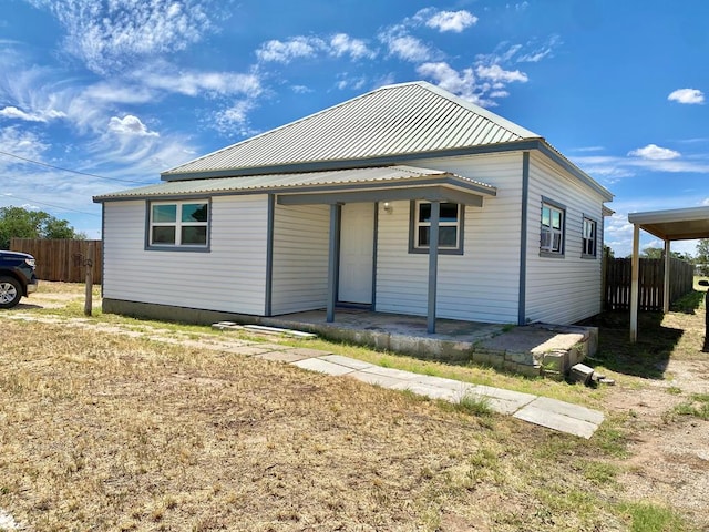 3007 S Anderson Rd, Big Spring, TX 79720 - view of front of home with a metal roof and covered porch