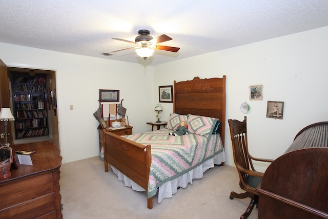 702 Capri Ct, Big Spring, TX 79720 - bedroom featuring light colored carpet and ceiling fan