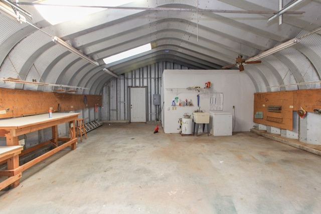 702 Capri Ct, Big Spring, TX 79720 - garage with a workshop area and a sink