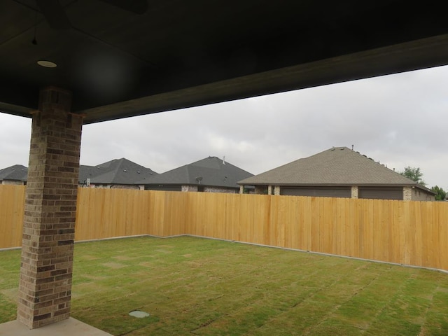 view of yard featuring a fenced backyard
