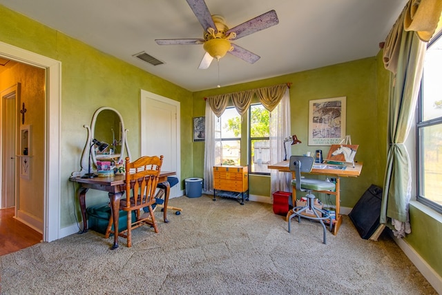 707 E County Rd 132, Midland, TX 79706 - carpeted home office with a ceiling fan and baseboards