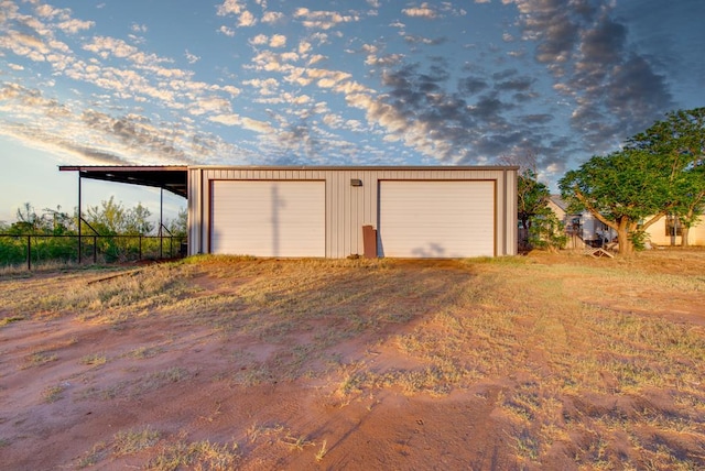 707 E County Rd 132, Midland, TX 79706 - garage with a detached garage and fence