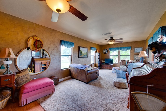 707 E County Rd 132, Midland, TX 79706 - carpeted living area featuring a ceiling fan