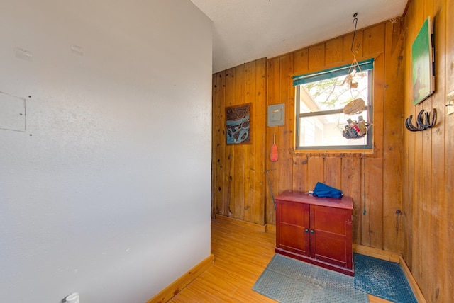 707 E County Rd 132, Midland, TX 79706 - corridor with wooden walls, wood finished floors, and baseboards