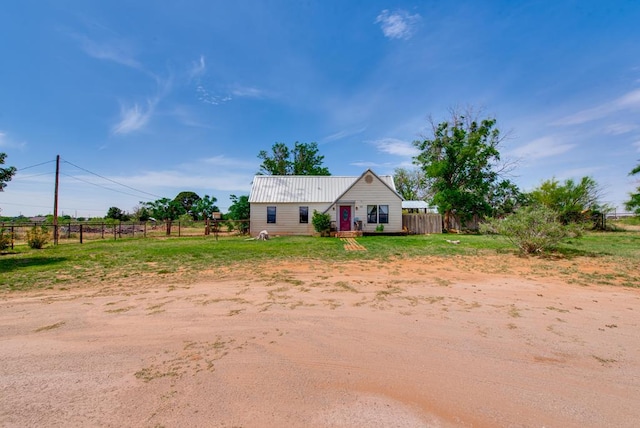 707 E County Rd 132, Midland, TX 79706 - view of front of house featuring fence and metal roof