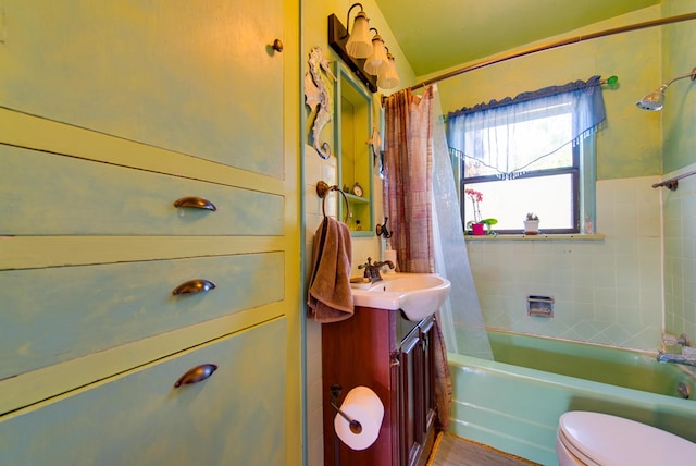 707 E County Rd 132, Midland, TX 79706 - full bathroom featuring vanity, toilet, and shower / bathtub combination with curtain