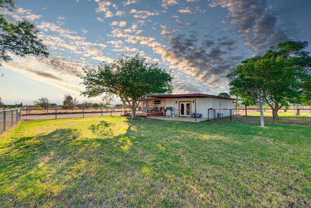 707 E County Rd 132, Midland, TX 79706 - view of yard with french doors and a patio