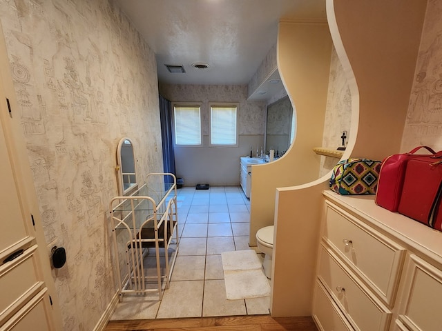 bathroom with tile patterned flooring