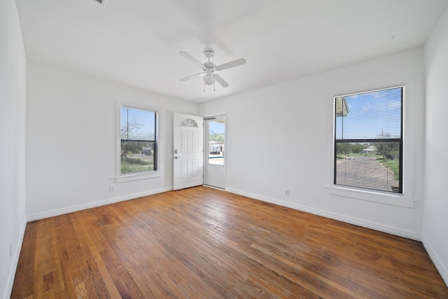 1410 Tucson Rd, Big Spring, TX 79720 - unfurnished room with hardwood / wood-style floors and a ceiling fan