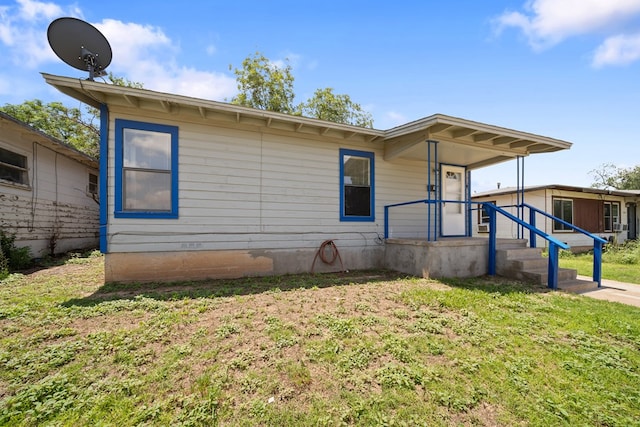 1410 Tucson Rd, Big Spring, TX 79720 - view of front of home with a front lawn