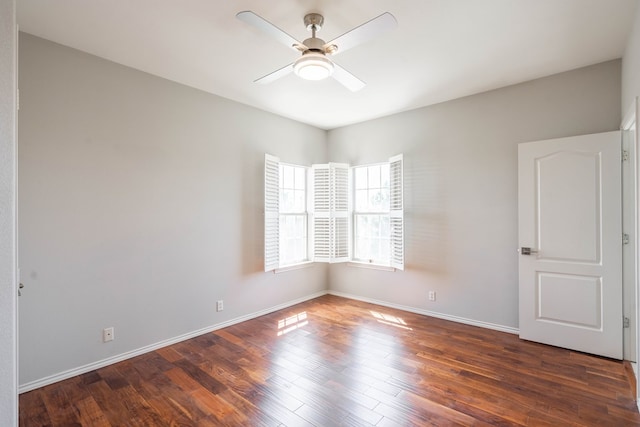 209 Bayberry Pkwy, Midland, TX 79705 - empty room with wood finished floors, ceiling fan, and baseboards