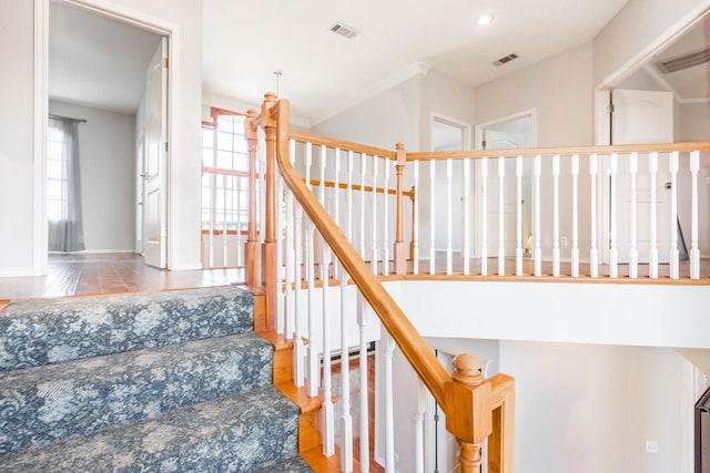 209 Bayberry Pkwy, Midland, TX 79705 - staircase featuring healthy amount of natural light, wood finished floors, baseboards, and recessed lighting