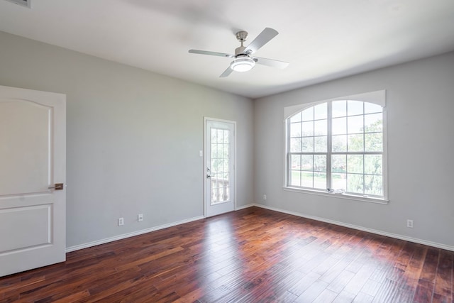 209 Bayberry Pkwy, Midland, TX 79705 - unfurnished room with wood finished floors, a ceiling fan, and baseboards