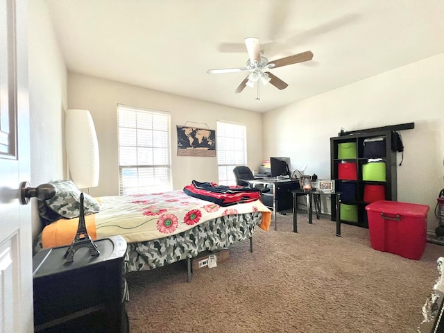 bedroom featuring ceiling fan and carpet floors