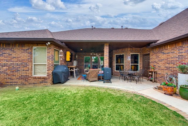 view of patio featuring ceiling fan and area for grilling