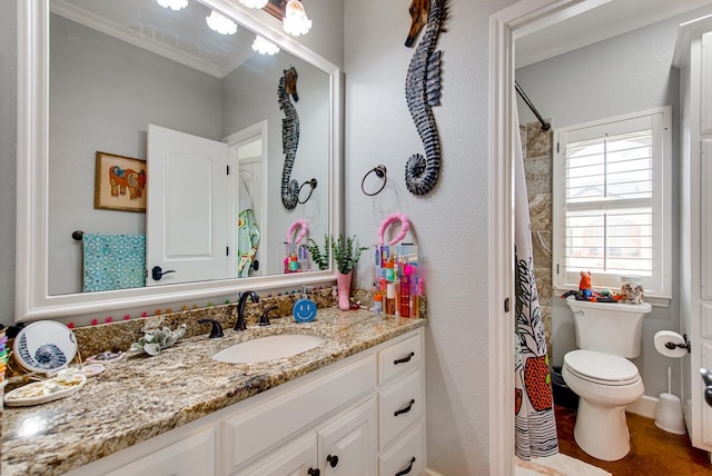 full bathroom featuring vanity, toilet, ornamental molding, and a shower with shower curtain