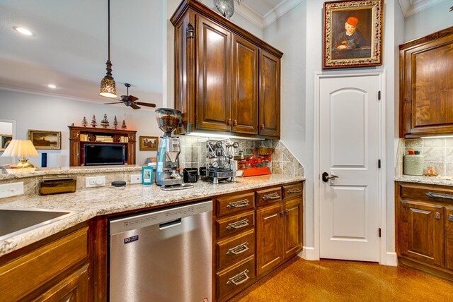 1102 Castle Rock Ct, Midland, TX 79705 - kitchen with stainless steel dishwasher, crown molding, a ceiling fan, carpet flooring, and decorative backsplash