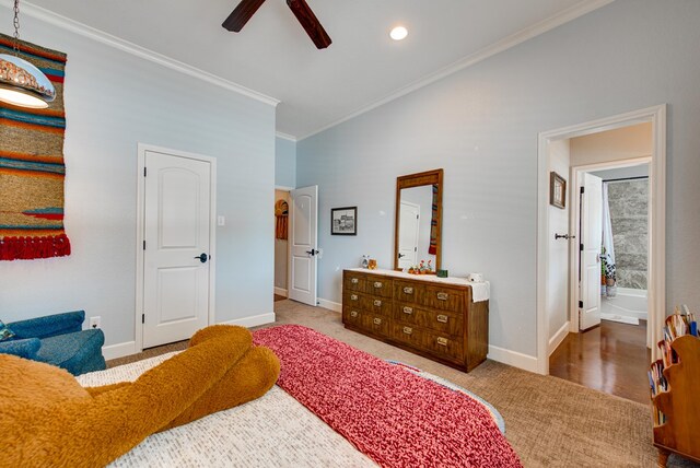 1102 Castle Rock Ct, Midland, TX 79705 - carpeted bedroom with ornamental molding, baseboards, and ceiling fan