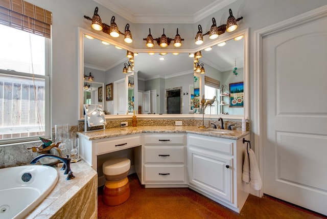 full bath with a tub with jets, crown molding, and vanity