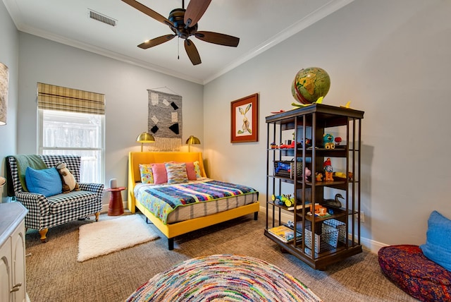bedroom with carpet, crown molding, baseboards, and ceiling fan