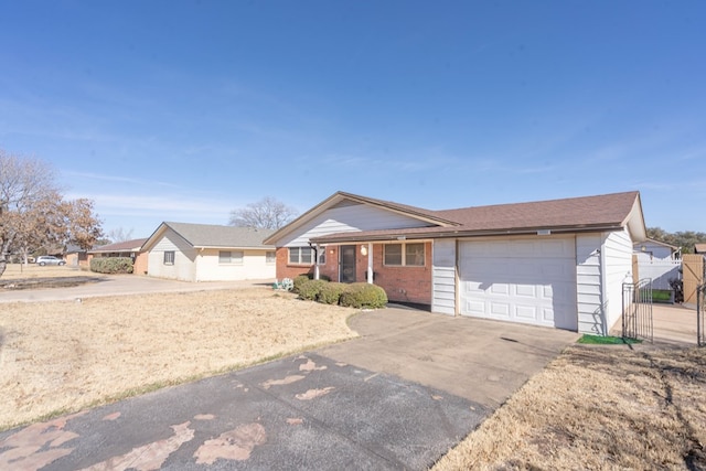 ranch-style house featuring a garage