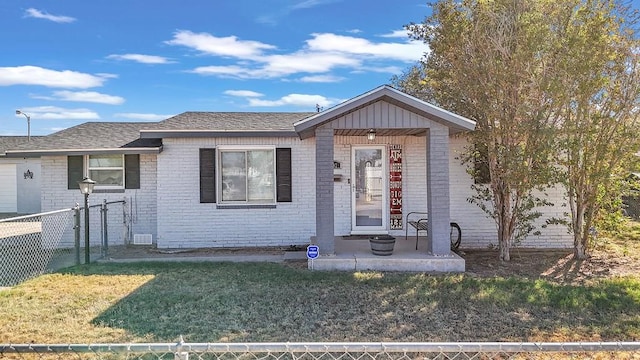 view of front of home with a front lawn