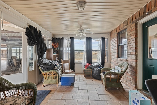 sunroom / solarium with ceiling fan