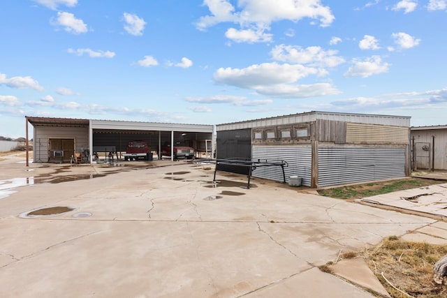 exterior space with a carport