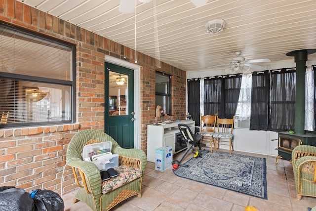 view of patio / terrace featuring ceiling fan