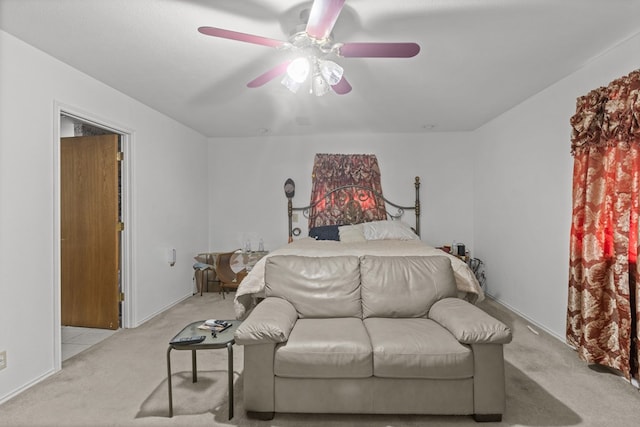 bedroom with light colored carpet and ceiling fan