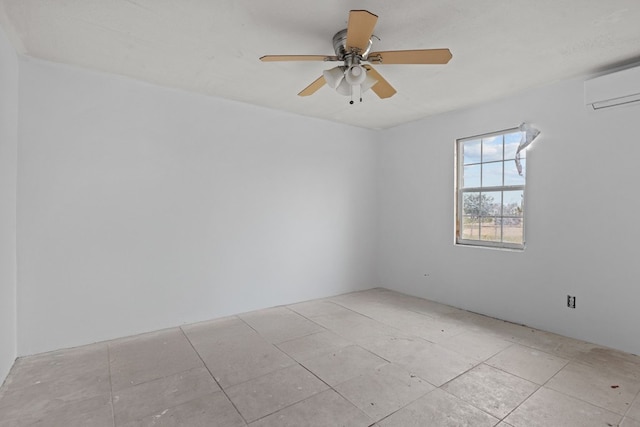 8528 W 24th St, Odessa, TX 79763 - spare room featuring a wall unit AC, a ceiling fan, and tile patterned floors