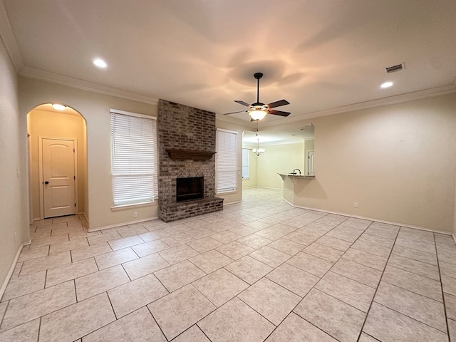 unfurnished living room featuring crown molding, light tile patterned floors, visible vents, and a ceiling fan