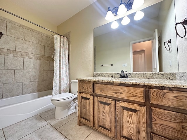 bathroom featuring a textured wall, toilet, tile patterned floors, shower / bath combination with curtain, and vanity